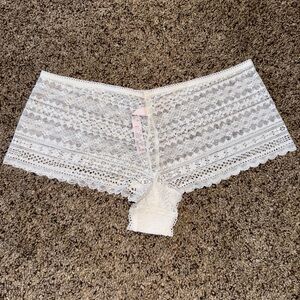 white laced Victoria’s Secret shortie panties. Size small